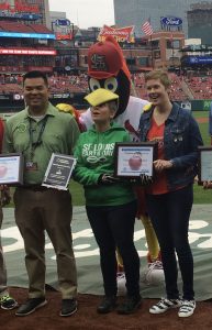 The GDA gets beaked by Fredbird while accepting our award.